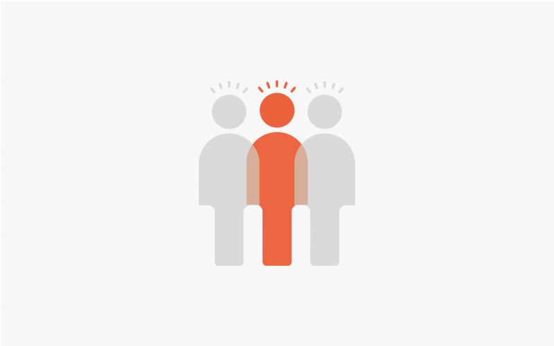 Graphic illustrating Equality with 3 stylised figures of the same size standing together in Audit Wales corporate colours (grey and orange)