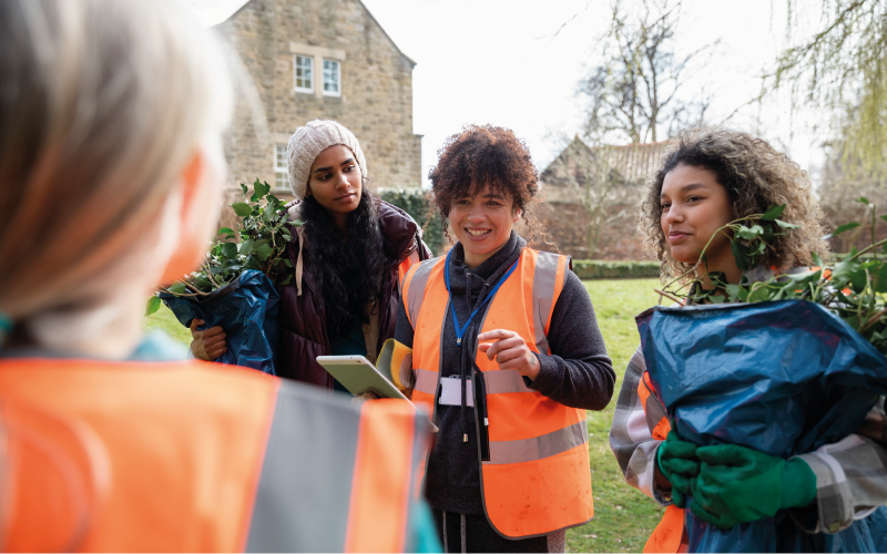 People gardening together in a community
