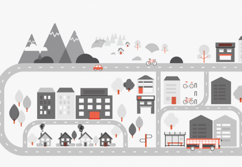 A graphic illustrating a stylised Welsh town. It includes housing, businesses and transport in the form of bicycles and buses, as well as references to the mountains and countryside.