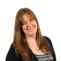 Headshot photograph of Anne Beegan